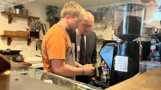 John Swinney makes coffee in Edinburgh