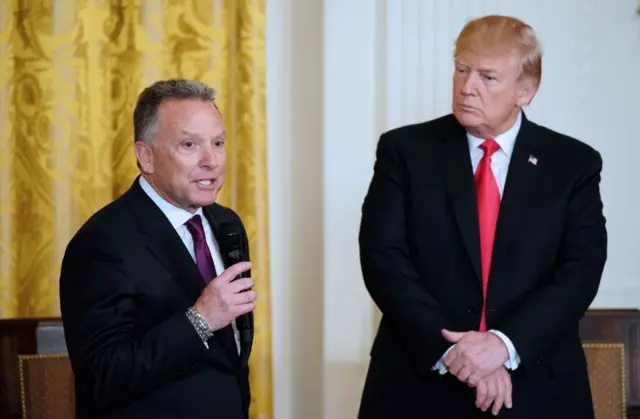 US President Donald Trump watches his friend Steve Witkoff