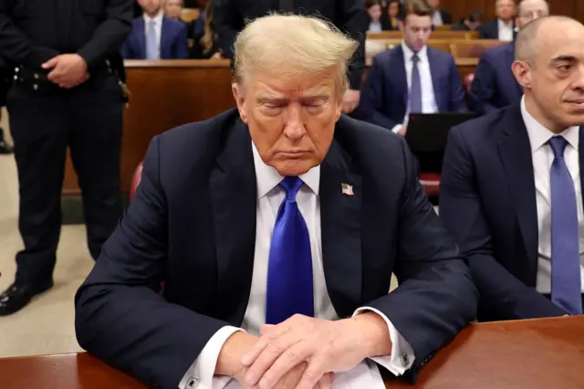 Former U.S. President Donald Trump sits in the courtroom during his hush money trial at Manhattan Criminal Court on May 30, 2024