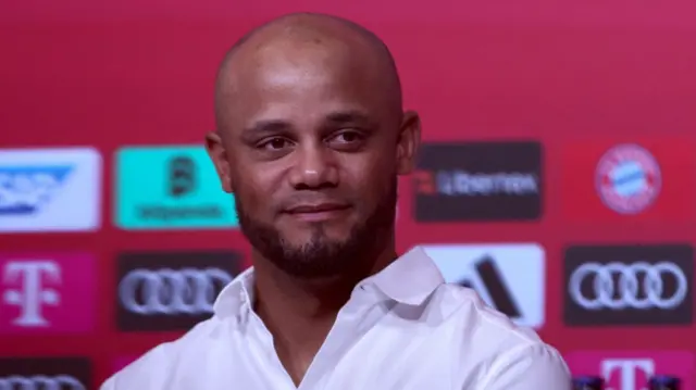 New coach Vincent Kompany smiles at his first Bayern Munich news conference