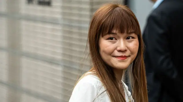 Clarisse Yeung, a former pro-democracy district councilor, arrives at the West Kowloon Magistrates' Courts ahead of a verdict hearing for her and 46 other activists in Hong Kong, China, on Thursday, May 30, 2024.