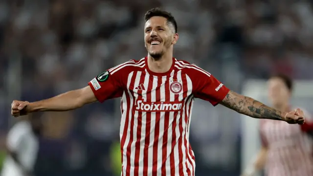 Olympiakos forward Stevan Jovetic celebrates