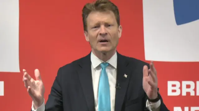 Richard Tice speaking on stage