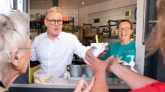 Labour leader Keir Starmer serving people ice cream