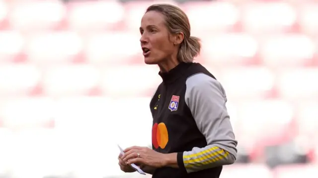 Lyon coach Sonia Bompastor shouts during a training session