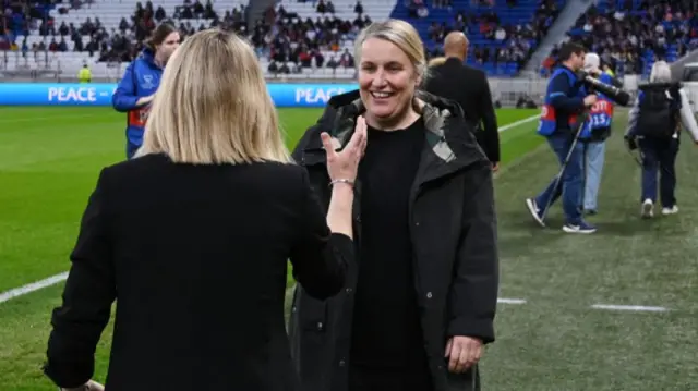 Emma Hayes shakes hands with Sonia Bompastor