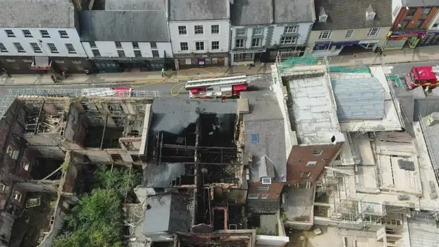 An aerial view of damage to the building during a previous fire