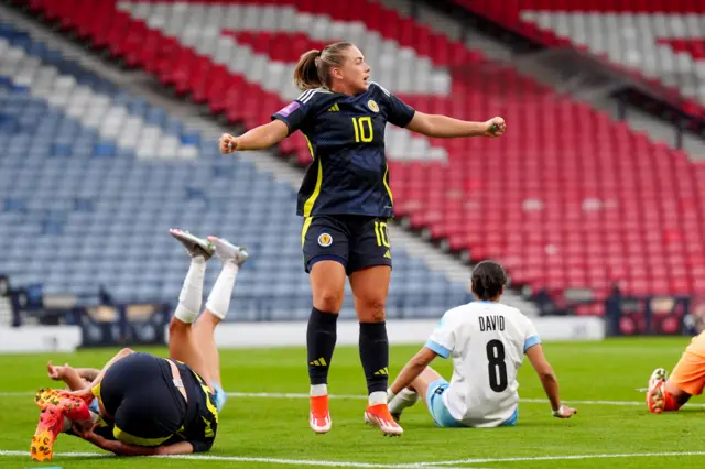 Kirsty Hanson celebrates scoring for Scotland against Israel