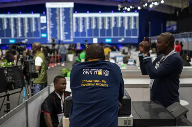 Election officials at the official centre in Midrand.