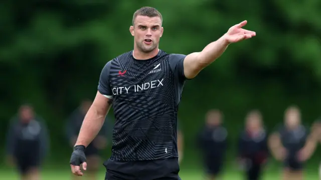 Ben Earl gestures during a Saracens training session