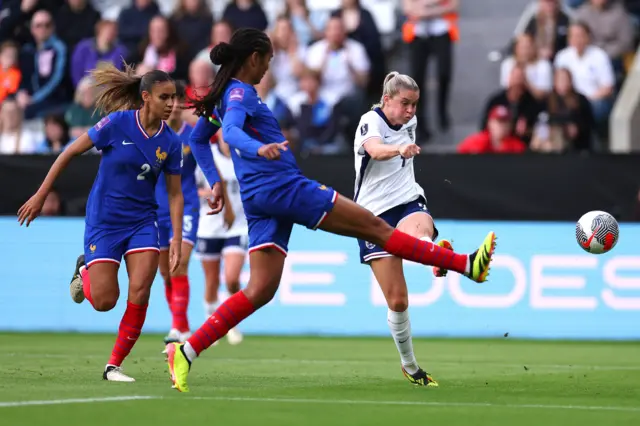 England's Alessia Russo shoots over the bar against France