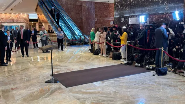 The empty lectern inside Trump Tower