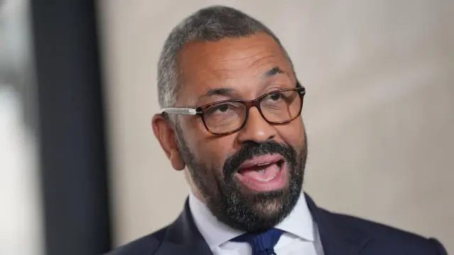 Home Secretary James Cleverly speaks to the media outside BBC Broadcasting House in London, after appearing on the BBC One current affairs programme, Sunday with Laura Kuenssberg