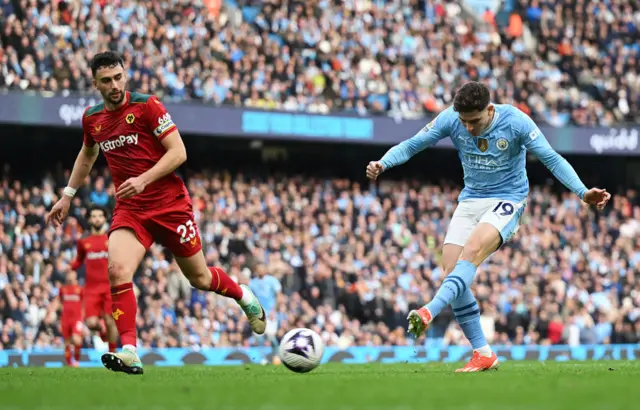 Julian Alvarez of Manchester City scores his team's fifth goal during the Premier League match between Manchester City and Wolverhampton Wanderers