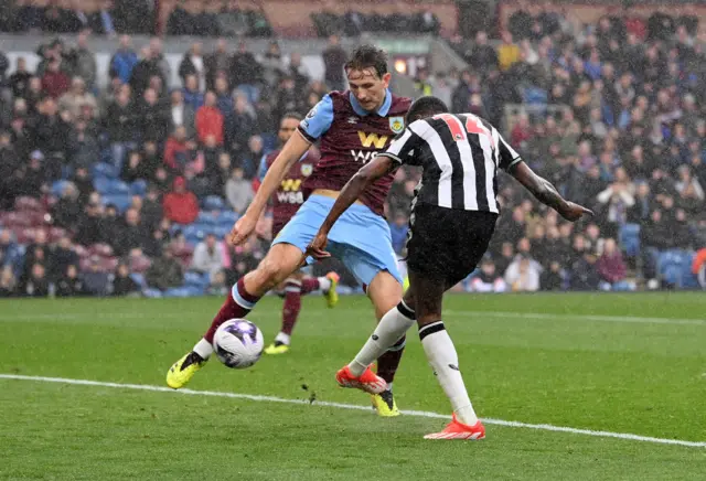 Alexander Isak of Newcastle United scores his team's fourth goal during the Premier League match between Burnley FC and Newcastle United