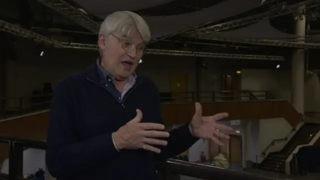 Conservative MP Andrew Mitchell speaks with BBC News at the West Midlands mayoral count