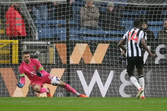 Arijanet Muric of Burnley makes a penalty save against Alexander Isak of Newcastle United during the Premier League match between Burnley FC and Newcastle United