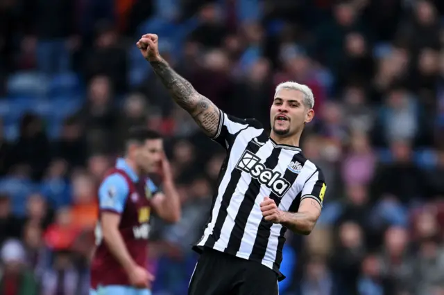 Bruno Guimaraes of Newcastle United celebrates scoring his team's third goal during the Premier League match between Burnley FC and Newcastle United