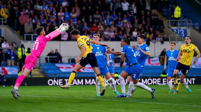 Jed Steer punches the ball