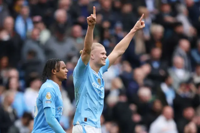 Erling Haaland of Manchester City celebrates scoring his team's third goal during the Premier League match between Manchester City and Wolverhampton Wanderers