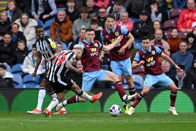 Bruno Guimaraes of Newcastle United scores his team's third goal during the Premier League match between Burnley FC and Newcastle United