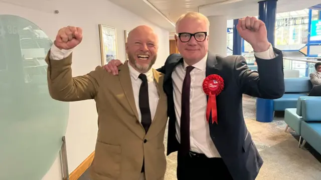 Labour MP Liam Byrne seen cheering with Richard Parker, the party's candidate in the West Midlands mayoral race