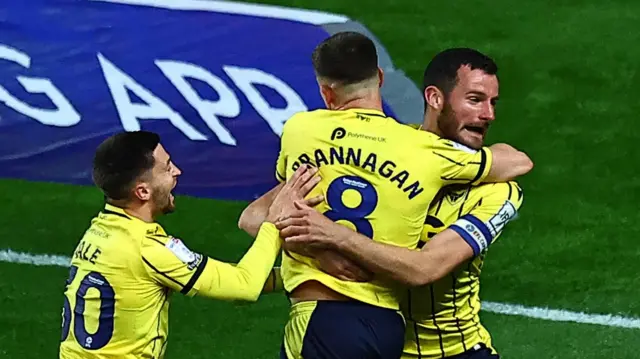 Oxford celebrate Elliott Moore's goal