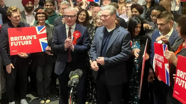 Richard Parker and Sir Keir Starmer celebrate the new mayor's win