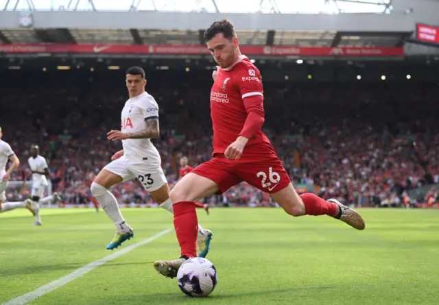 Andy Robertson puts in a cross