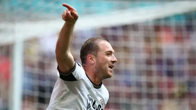 Michael Cheek celebrates for Bromley
