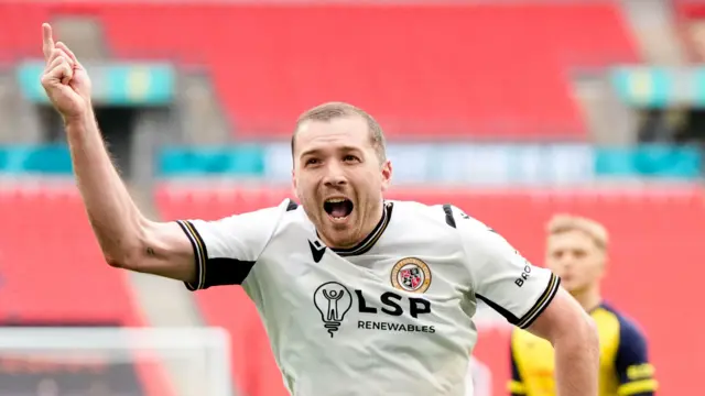 Michael Cheek celebrates