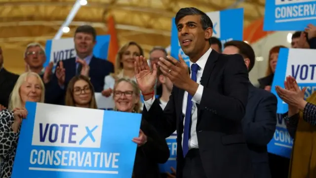 Rishi Sunak applauds with suppoas he visits Teesside in Tees Valley the morning after the local elections