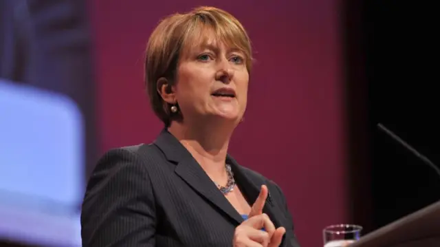 Jacqui Smith speaking at a conference