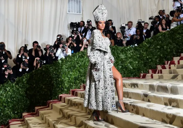 Rihanna arrived for the 2018 Met Gala wearing a bishop’s hate in homage to the theme ‘Heavenly Bodies: Fashion and the Catholic Imagination’