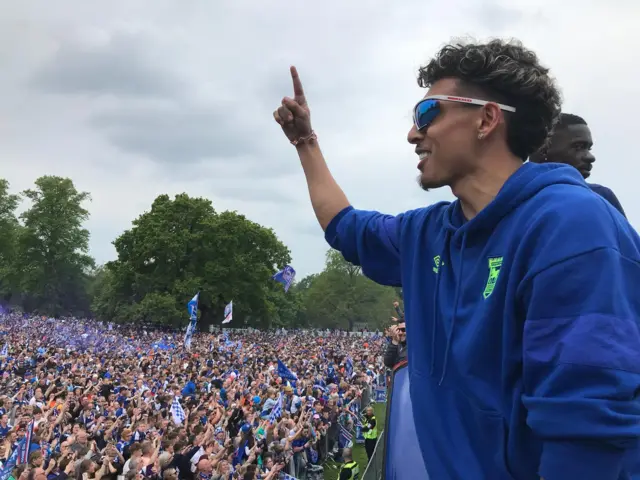 Ipswich Town's Jeremy Sarmiento raises an index finger to the crowd in Christchurch Park