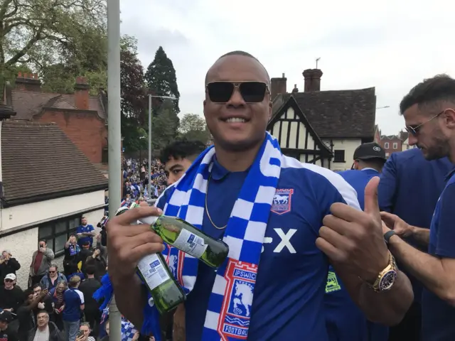 Fabio Wardley on a bus with beer