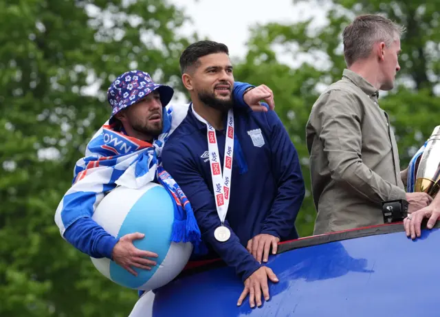 Conor Chaplin and Sam Morsy with a beachball