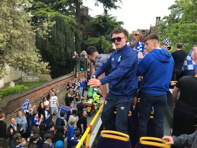 Ipswich Town's Nathan Broadhead on an open-top bus near Christchurch Park