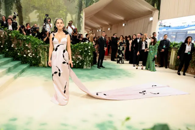 Lily James attends The 2024 Met Gala Celebrating "Sleeping Beauties: Reawakening Fashion" at The Metropolitan Museum of Art on May 06, 2024 in New York City