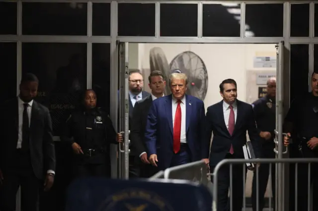 Trump walking into courthouse