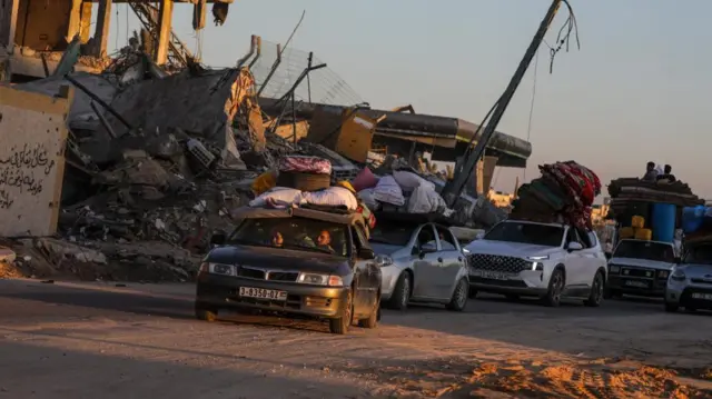 Internally displaced Palestinians leave with their belongings following an evacuation order issued by the Israeli army, in Rafah, southern Gaza Strip, 06 May 2024 (issued 07 May 2024).