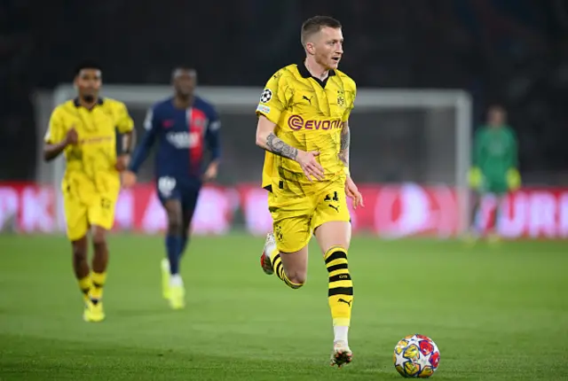 Marco Reus of Borussia Dortmund runs with the ball