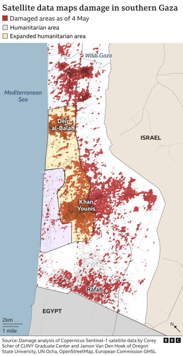 A map of the Gaza Strip. Yellow shading to the left shows the expanded humanitarisn zone, however much of it is covered in red dots that indicate damage