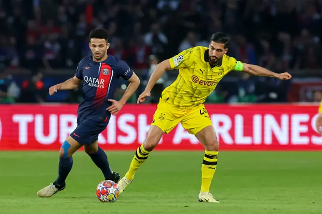 Goncalo Ramos looks on as Emre Can controls the ball