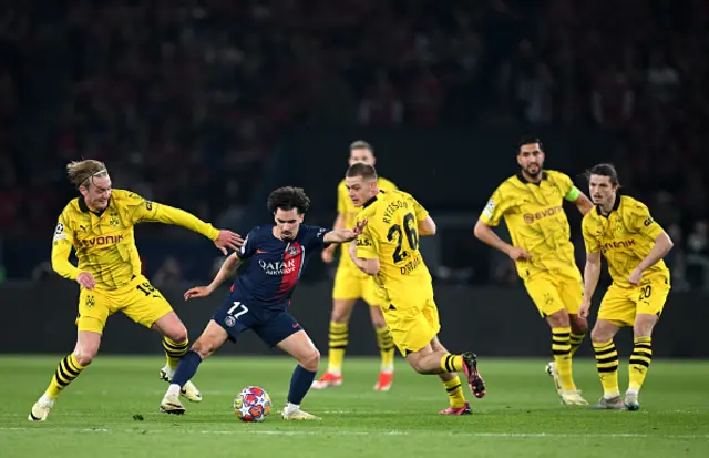 Vitinha of Paris Saint-Germain controls the ball whilst under pressure