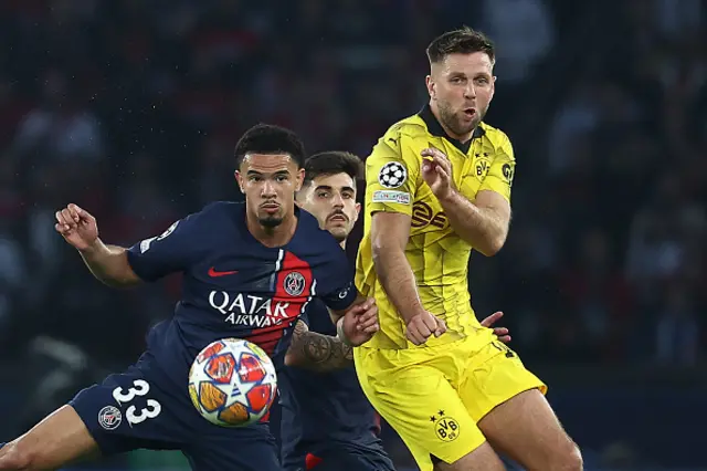 Warren Zaire-Emery (L) and Dortmund's German forward #14 Niclas Fuellkrug (R) fight for the ball