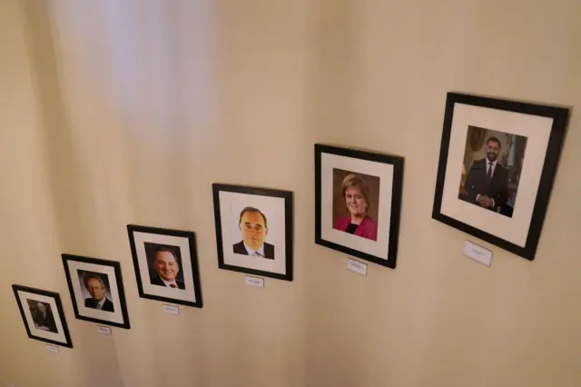 Images of six of Scotland's first ministers on the wall of Bute House staircase