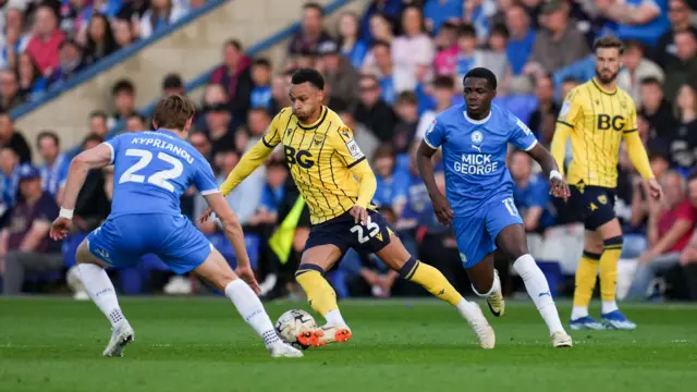 Peterborough v Oxford match action