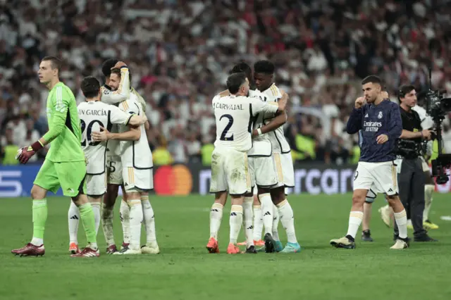 Madrid players celebrate at full time