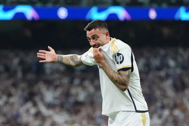 Joselu blows kisses to the fans